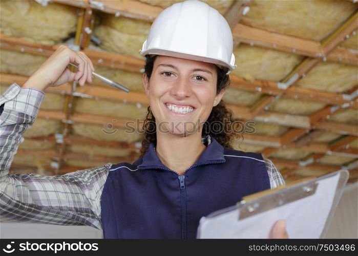 a young smiling businesswoman builder