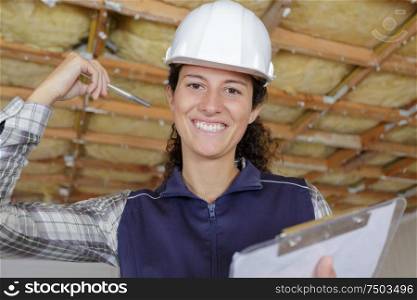 a young smiling businesswoman builder