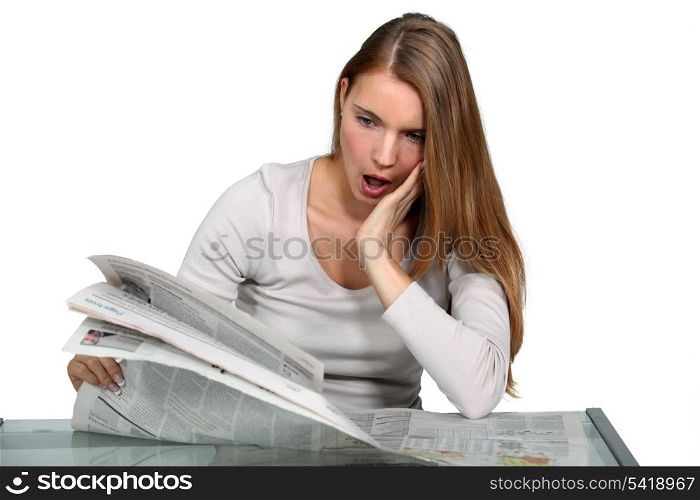A young woman astonished at the news.