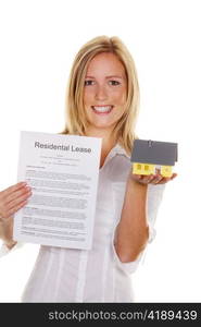 a young woman has successfully completed a lease. in english