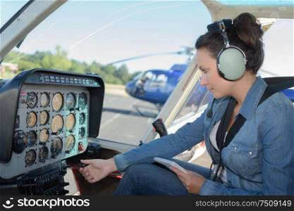 a young woman helicopter pilot