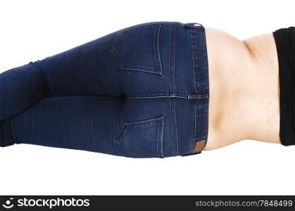 A young woman in jeans lying from the back on the floor showing herbehind, isolated on white background.