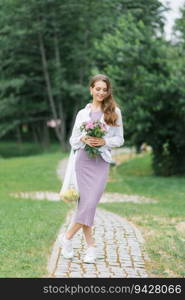 A young woman in white lilac clothes with an eco-bag with fruit on the background of nature. Plastic-free concept