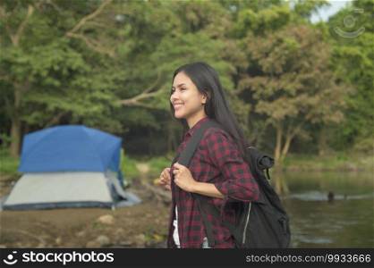 A young woman is enjoying with nature , holiday and travel concept .  . Young woman is enjoying with nature , holiday and travel concept .  