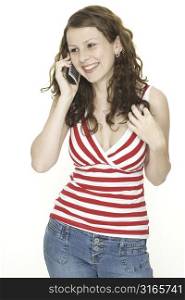 A young woman laughs on the phone