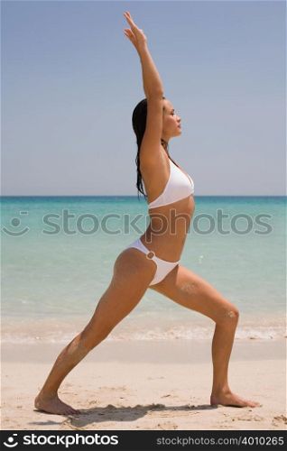 A young woman practising yoga