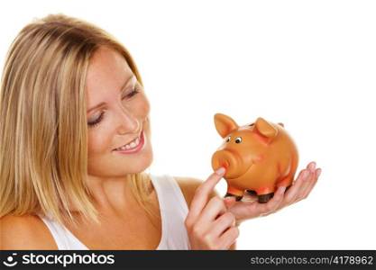 a young woman saves money and coins for the future. pension and savings.