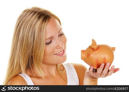 a young woman saves money and coins for the future. pension and savings.