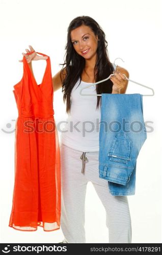 a young woman thinks to what clothes they wear. jean or dress