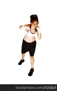 A young woman training in shadow boxing for her next fight in the ring,for white background.
