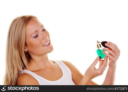 a young woman with a bottle of perfume and cosmetics personal hygiene