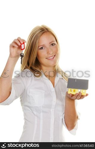 a young woman with a model house and apartment keys.