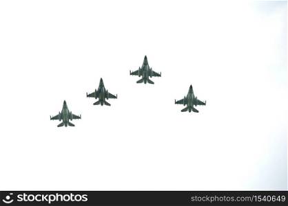 Aalten (Barlo), 17 juni 2014. F16s of the Royal Netherlands Air Force carry out a missing man flight formation to honor the crew of a Lancaster bomber that crashed 70 years ago