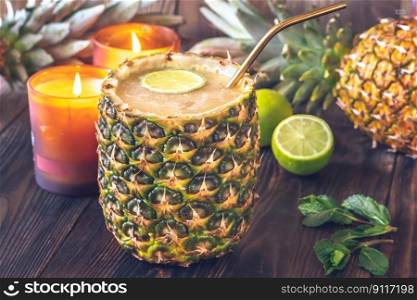 Abacaxi Ricaco cocktail served on pineapple shell