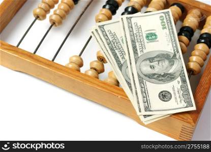 abacus and dollar. Old abacus symbolizing the last time and new dollars