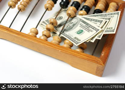 abacus and dollar. Old abacus symbolizing the last time and new dollars