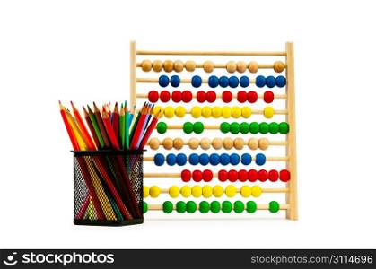 Abacus and pencils isolated on white