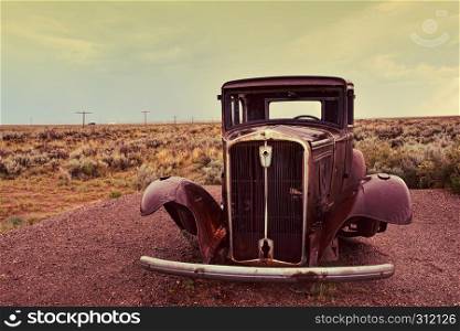 Abandoned car near the entrance to the Painted desert, Arizona.