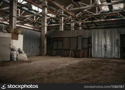 Abandoned factory corridor, grunge interior, nobody. Old broken industry building, empty industrial house. Abandoned factory corridor, grunge interior