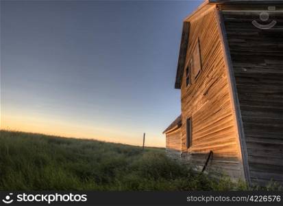Abandoned Farmhouse Saskatchewan Canada sunset and prairie view