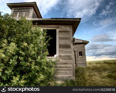 Abandoned Farmhouse Saskatchewan Canada sunset and prairie view