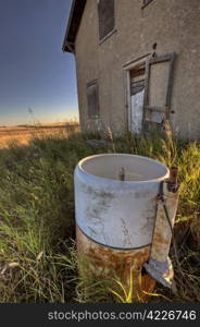 Abandoned Farmhouse Saskatchewan Canada sunset and prairie view