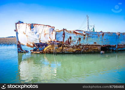 abandoned fishing and shrimp boat near folly beach south carolina