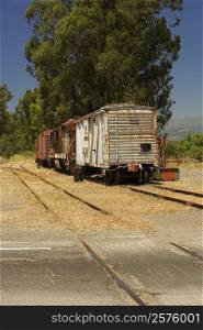 Abandoned freight train on railroad track