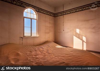 Abandoned House Full of Sand in the Ghost Town of Kolmanskop, Namibia