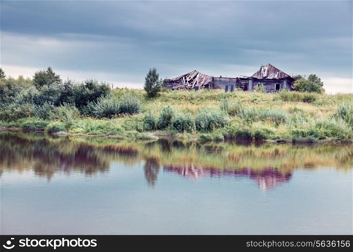 abandoned house near the water