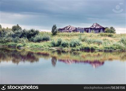 abandoned house near the water