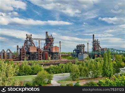 Abandoned Industrial factory in Duisburg, Germany. Public park Landschaftspark, landmark and tourist attraction.