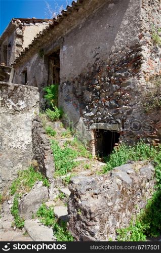 abandoned medieval stone country house in Sicily