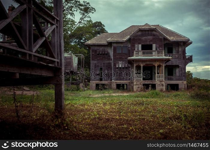 abandoned old wood house on twilight