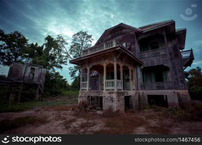 abandoned old wood house on twilight