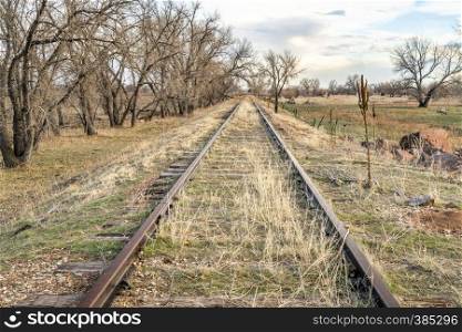 abandoned railroad tracks in a prairie of eastern Colorado