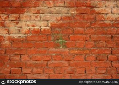 Abandoned red brick wall