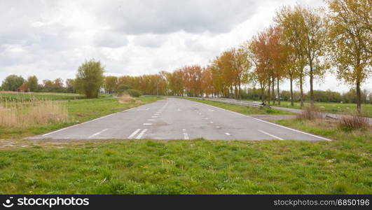 Abandoned road in the Netherlands, not being used for a long time