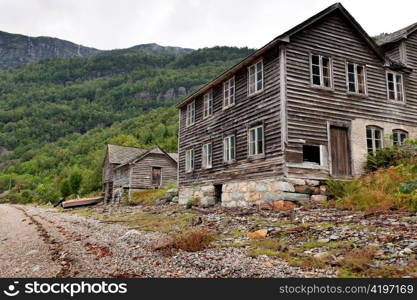 Abandoned wooden houses at the coast, Hardanger, Hardangerfjord, Hardangervidda, Hardanger, Norway