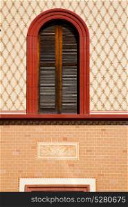 abbiate varese italy abstract window in the church and venetian blind