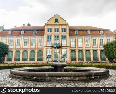 abbots palace landmark in gdansk danzig oliva park poland. famous building with fountain in garden. historical residence house.