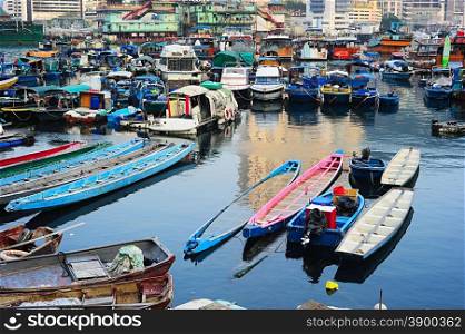 Aberdeen - famous to tourists destinaton for its floating village and floating seafood restaurants. Hong Kong