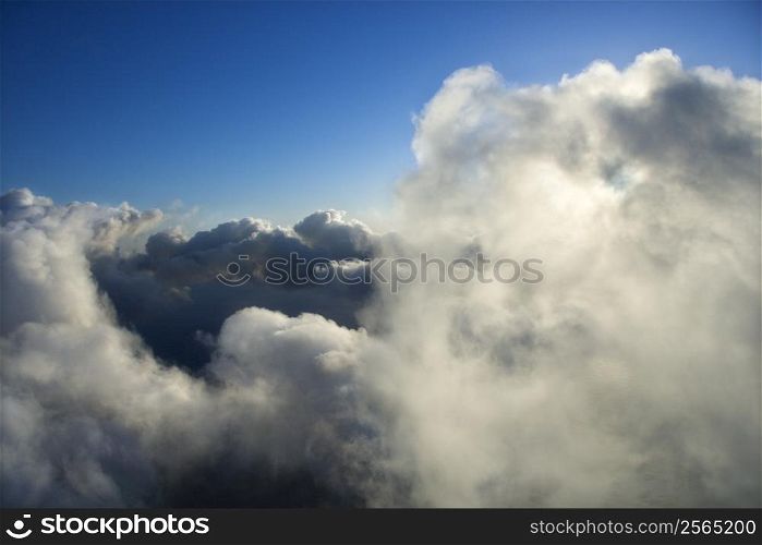 Above clouds view with blue sky.