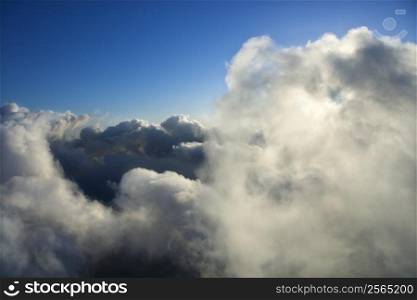 Above clouds view with blue sky.