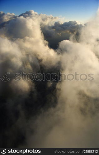 Above clouds view with blue sky.