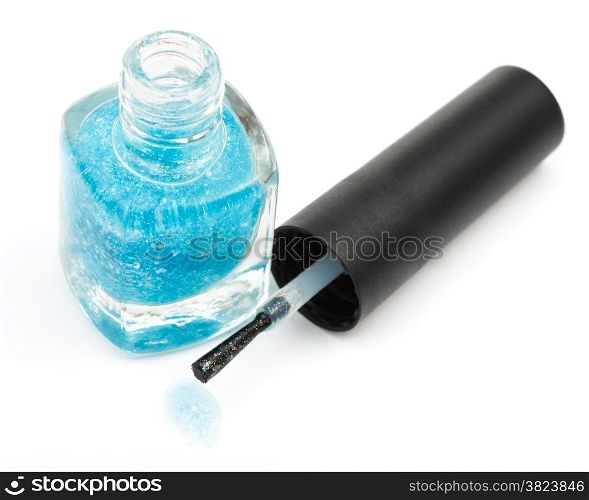 above view of bottle with spilled turquoise nail polish on white background