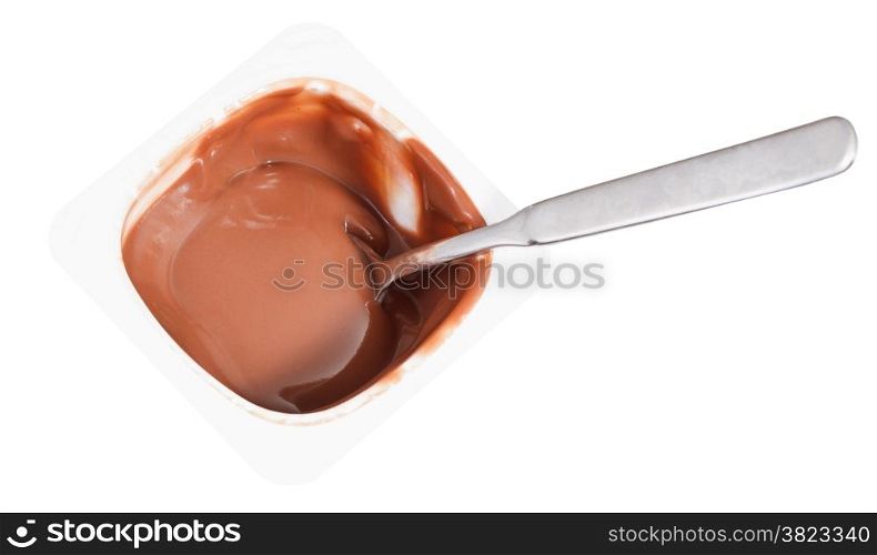 above view of chocolate yogurt and spoon in disposable plastic cup isolated on white background