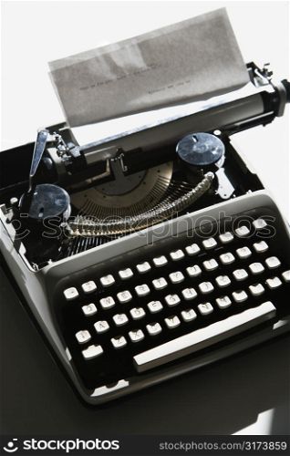 Above view of typewriter with paper.
