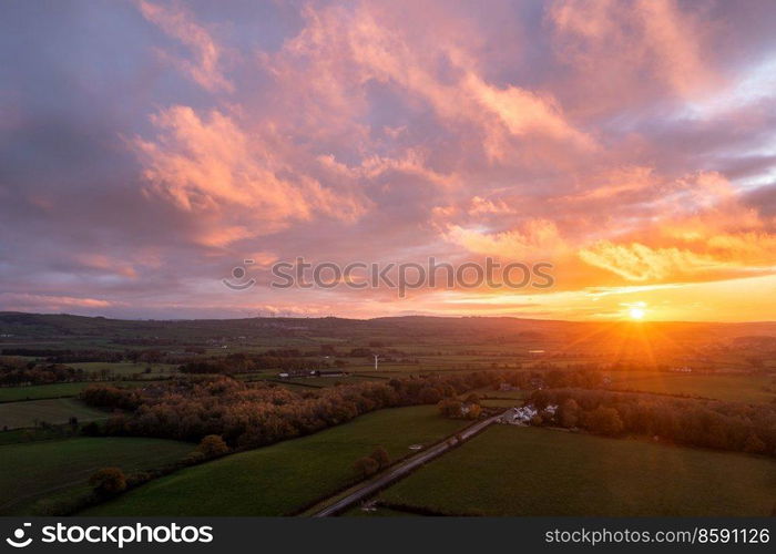 Absolutely stunning aerial drone landscape sunset image of Lake DAistrict countryside during Autumn