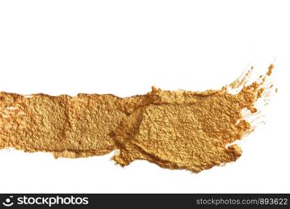 Abstract acrylic gold brush stroke. Isolated on white.